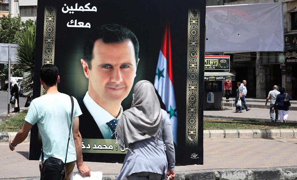 توقعات بفوز بشار الأسد بولاية رئاسية رابعة في خضم 10 سنوات من حرب مدمرة