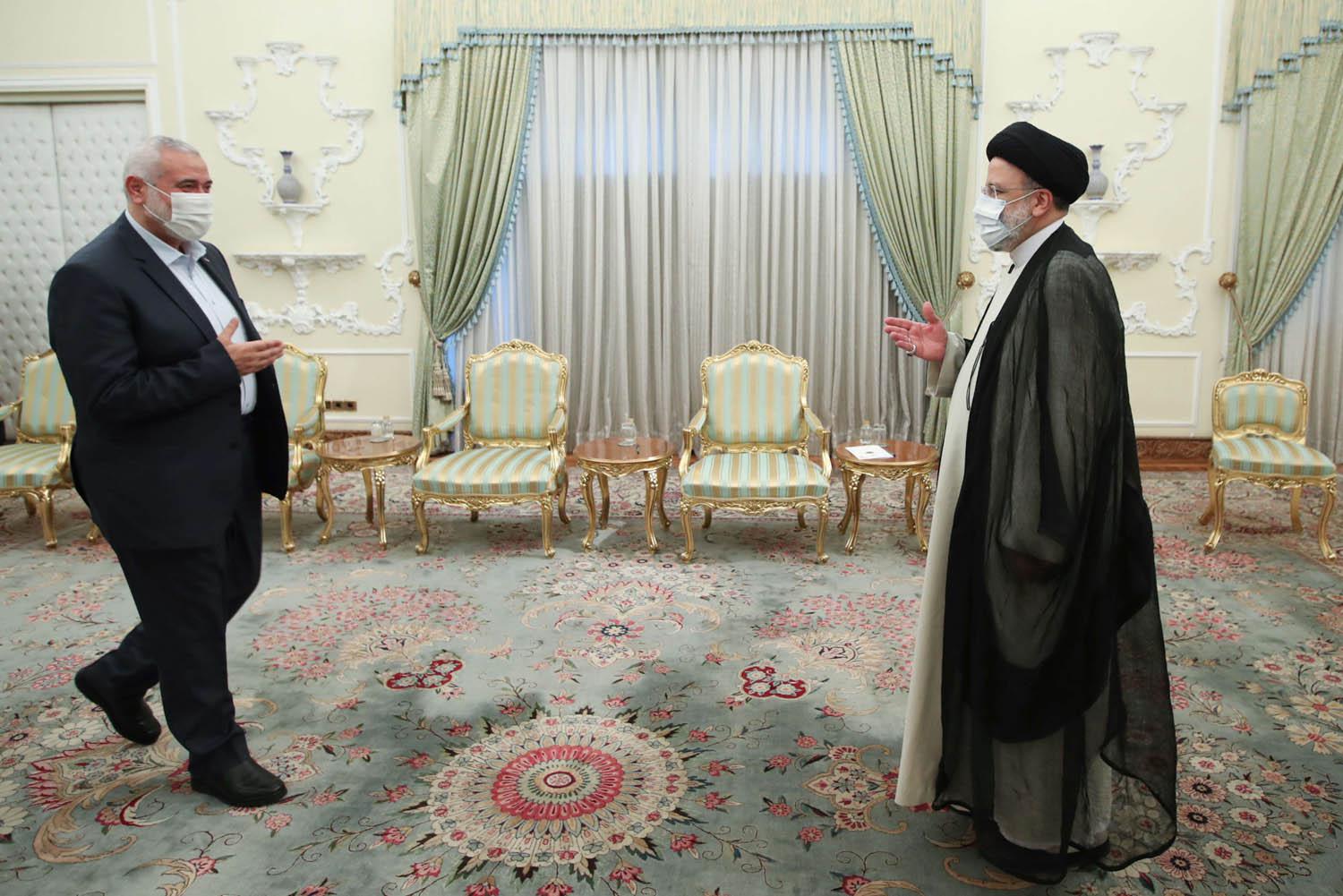 الرئيس الإيراني إبراهيم رئيسي يستقبل رئيس حماس اسماعيل هنية