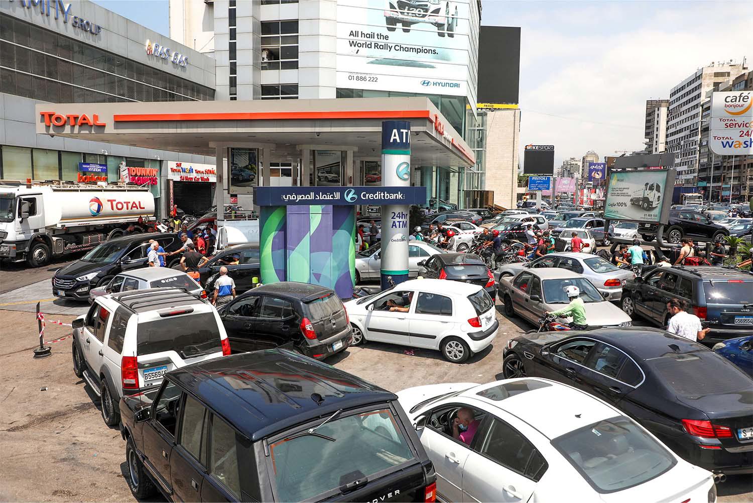 Meanwhile thousands of cars queue for hours to get fuel at Lebanon's gas stations