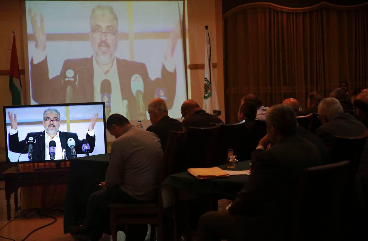 رئيس حماس الخارج خالد مشعل في مؤتمر صحفي منقول في الدوحة