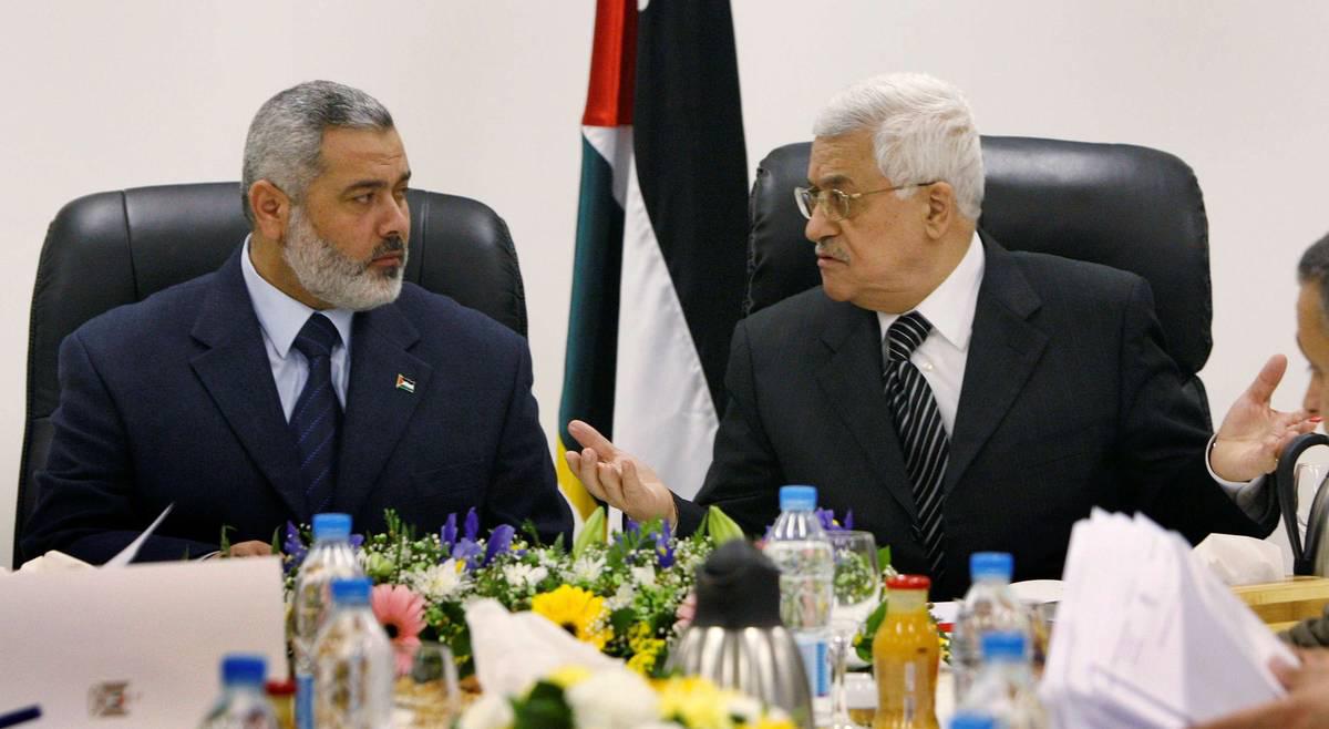 الرئيس الفلسطيني محمود عباس ورئيس حماس إسماعيل هنية