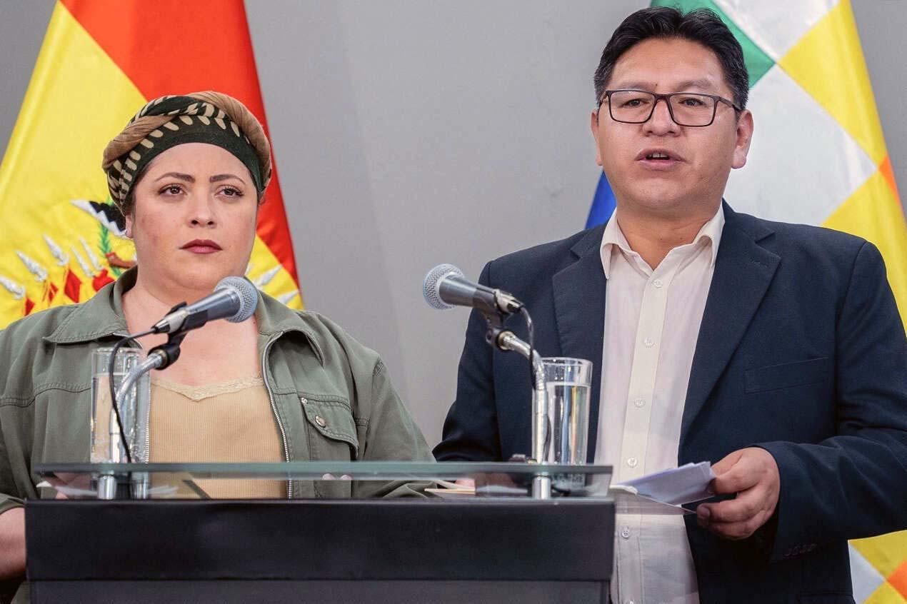 Bolivia's Deputy Foreign Minister Freddy Mamani (R)