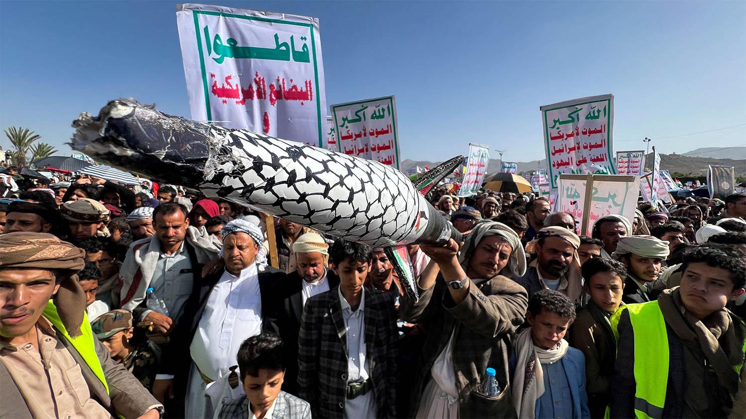 Houthi supporters demonstrate to show solidarity with the Palestinians in the Gaza Strip