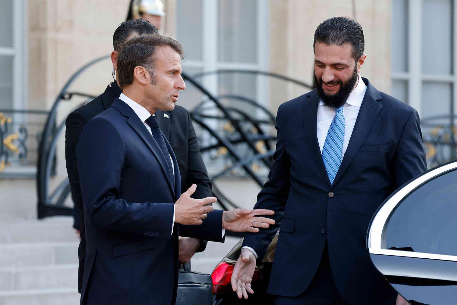 Macron welcoming Sharaa