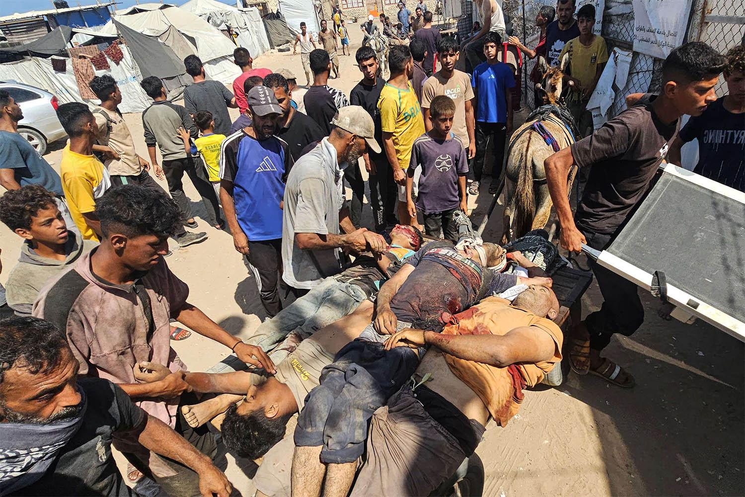Bodies of victims in Rafah  after they were reportedly shot as they waited to receive food parcels