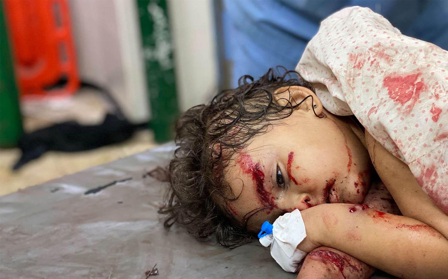 Gaza health authorities said Israeli gunfire and military strikes killed at least 20 Palestinians in separate attacks in north and southern areas