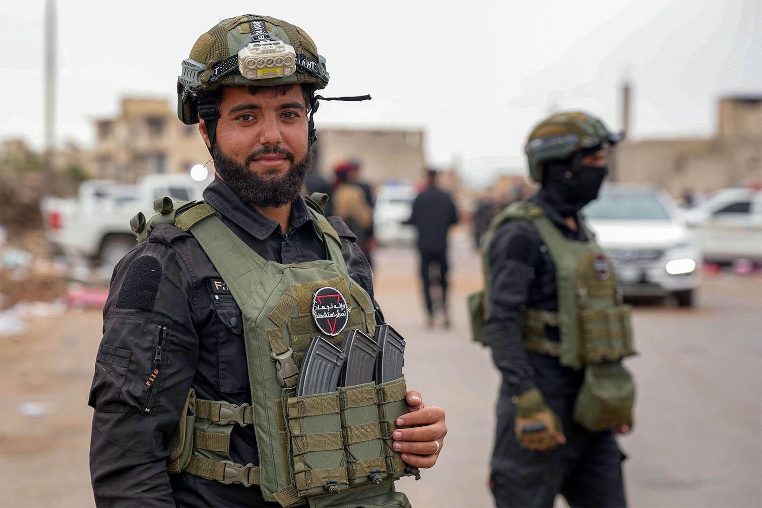 Syrian security forces take up position on roads near Sweida