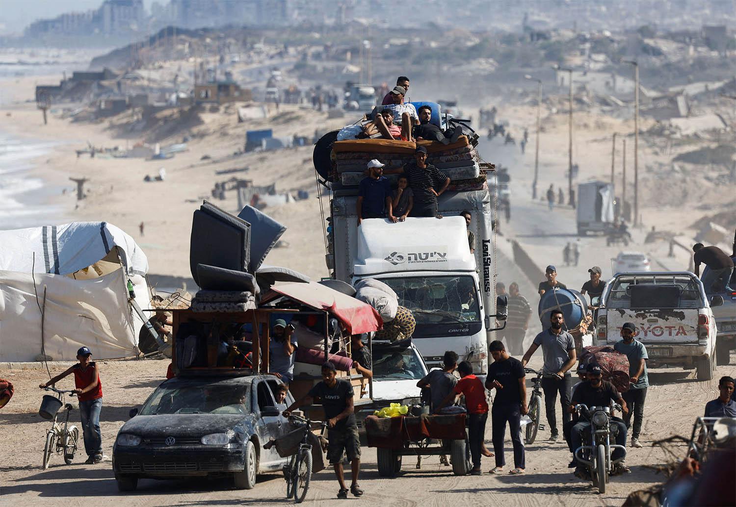 Displaced Palestinians fleeing northern Gaza due to an Israeli military operation