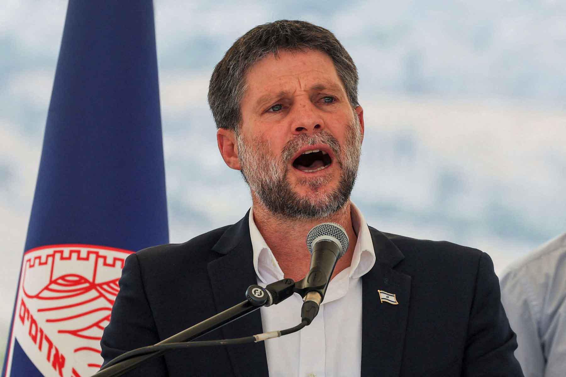 Israeli Finance Minister Bezalel Smotrich speaks at a news conference regarding settlements expansion, near the Israeli settlement of Maale Adumim in the Israeli-occupied West Bank, August 14, 2025. 