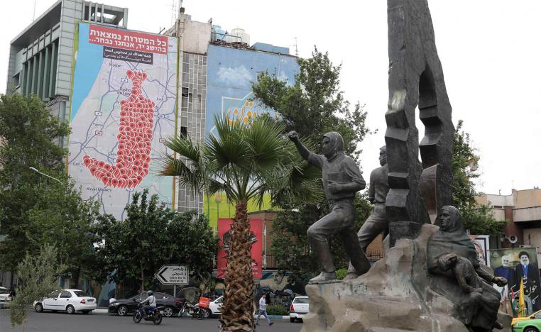An anti-Israel billboard featuring the shape of a traditional Yemeni dagger made of map pins and sentences reading All targets in Israel are within reach